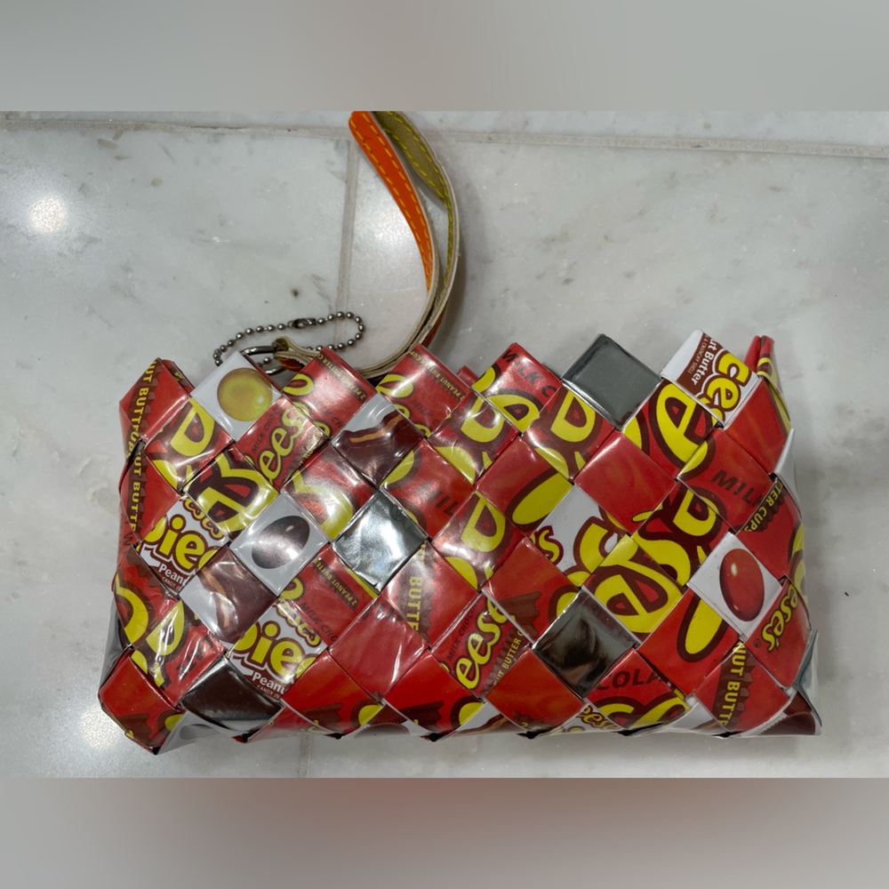 Reese’s Pieces small handbag with zipper and handle. Never used.